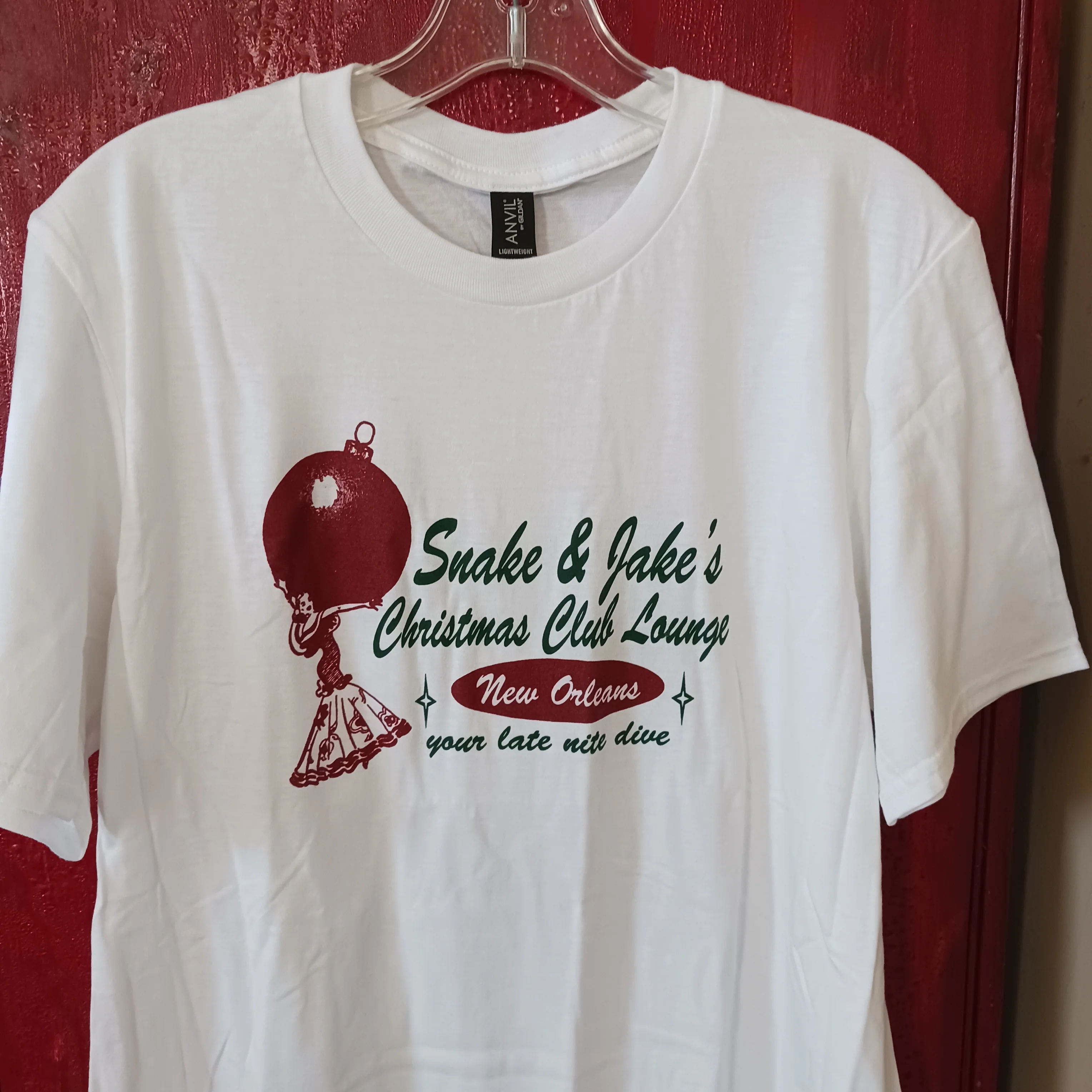 *SALE ONLY 2X & 3X LEFT* SNAKE & JAKE'S CHRISTMAS CLUB LOUNGE UNISEX RETRO LADY WITH ORNAMENT LOGO TEE